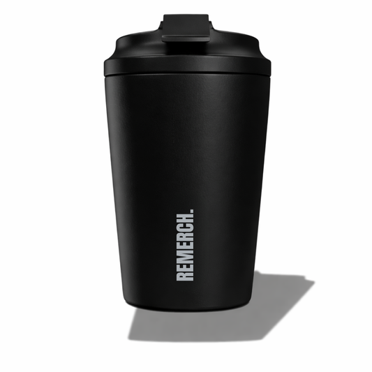Black tumbler with 'REMERCH.' branding on a white background